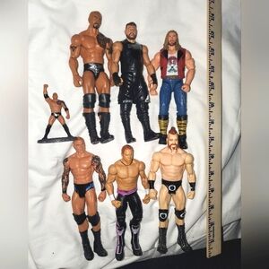 :5 WWE Wrestling Randy Orton the viper Sheamus Kevin Owens curt hawkin rock thor